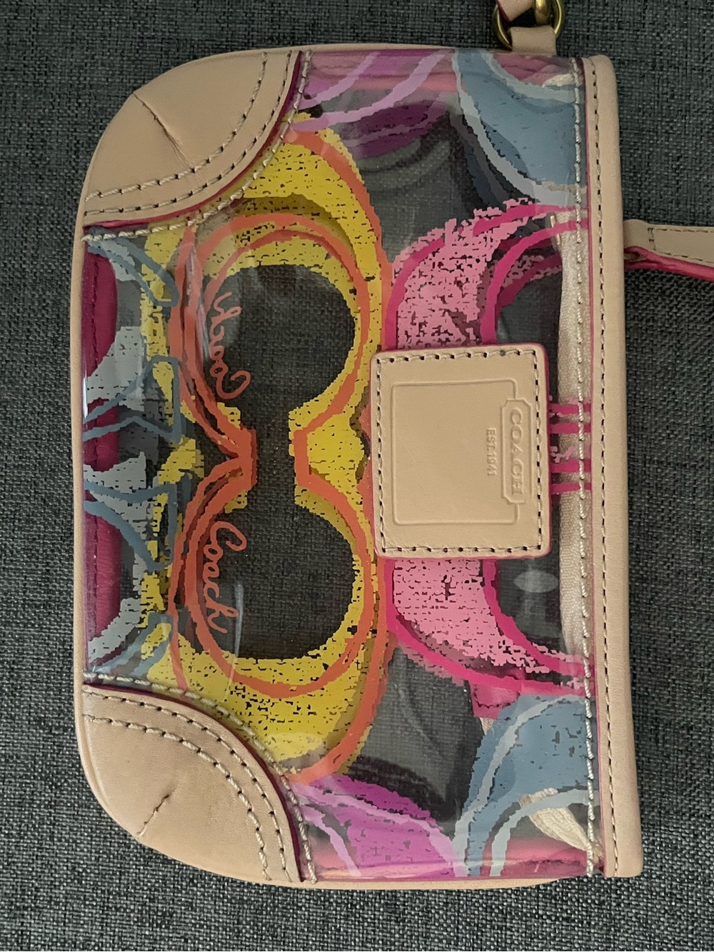 Coach Multicolor Signature Graphic clear Wristlet in Pink, Yellow, Blue, Cream